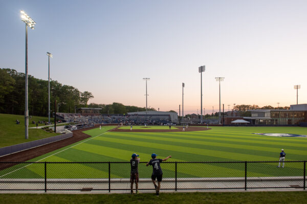 An athletic field at dusk.