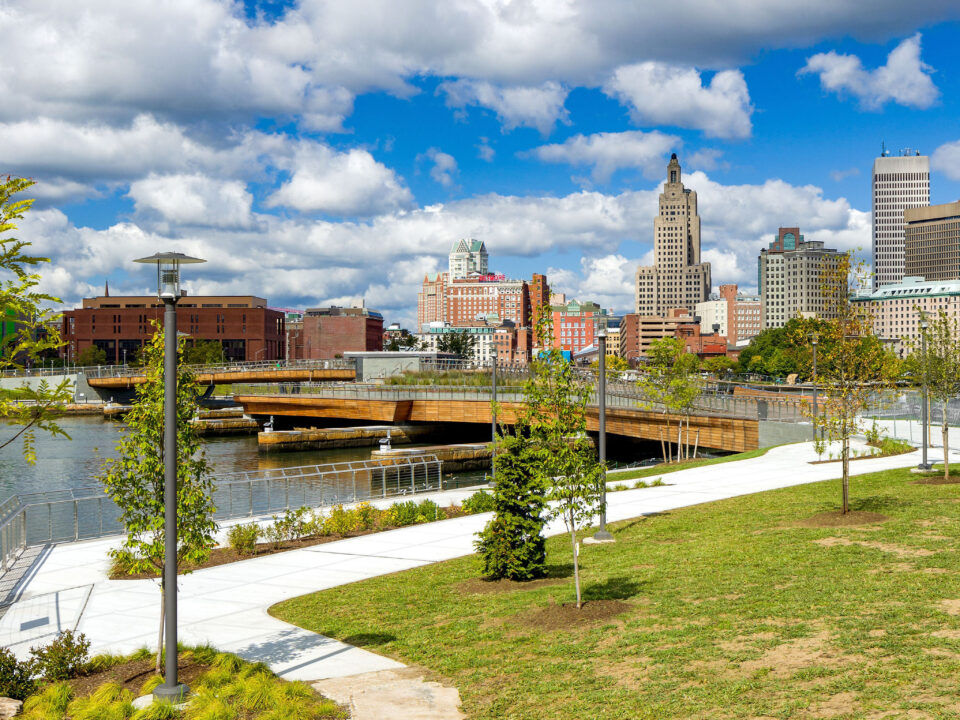 A grassy area adjacent to the Michael S. Van Leesten Memorial Bridge.