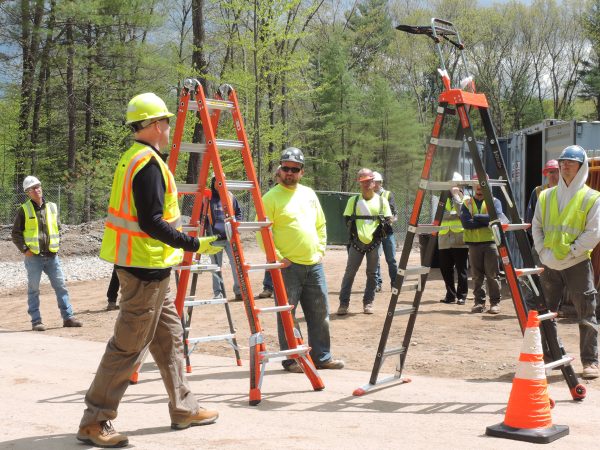 construction workers demonstrating commitment to safety.